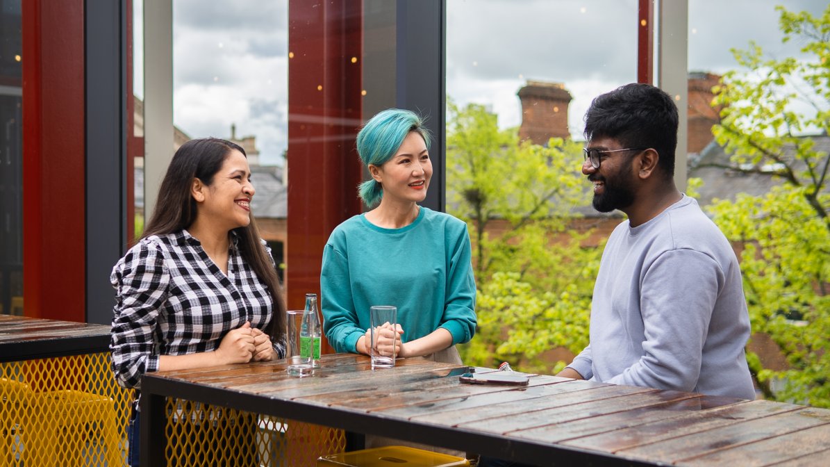 International students chatting on campus