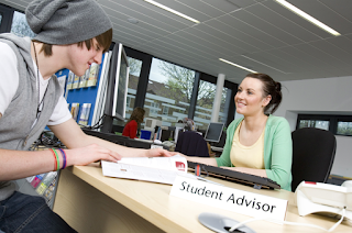 Estranged student talking to a student adviser at university