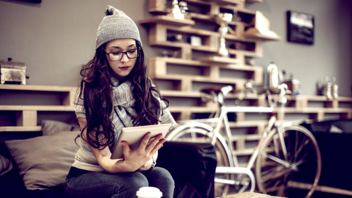 A theatrical trend translator working on tablet 