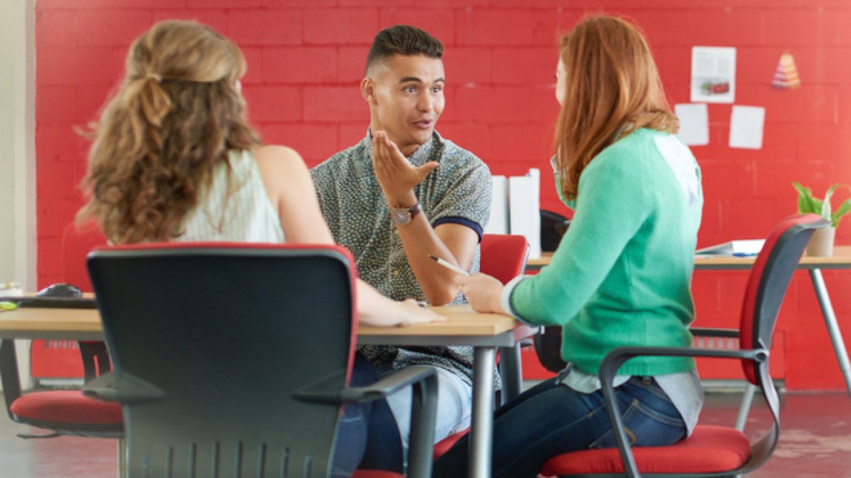 Apprentices in a meeting