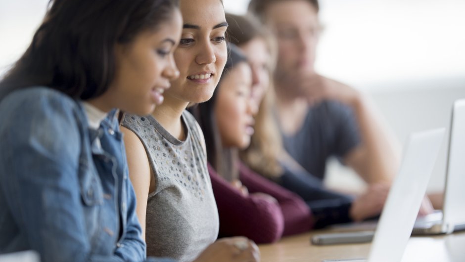 students on laptop