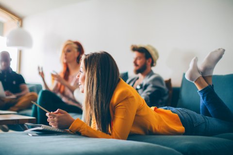 student relaxing at their accommodation